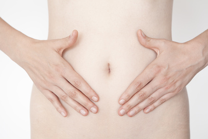 Woman's hands on stomach
