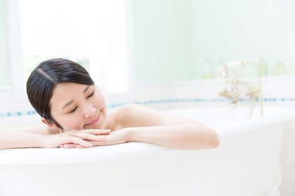 young asian woman in the bathtub